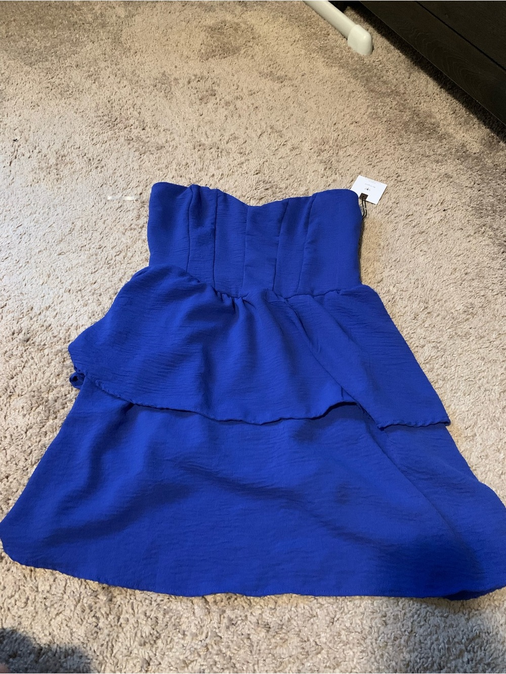Women’s blue strapless dress
